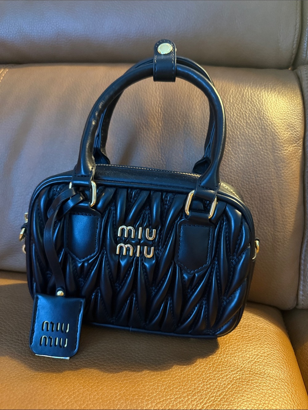 Black Quilted Leather Top-Handle Satchel with Gold Hardware